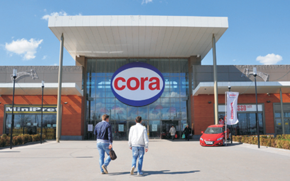 Cora își vinde afacerile din România. Cine va prelua lanțul de magazine