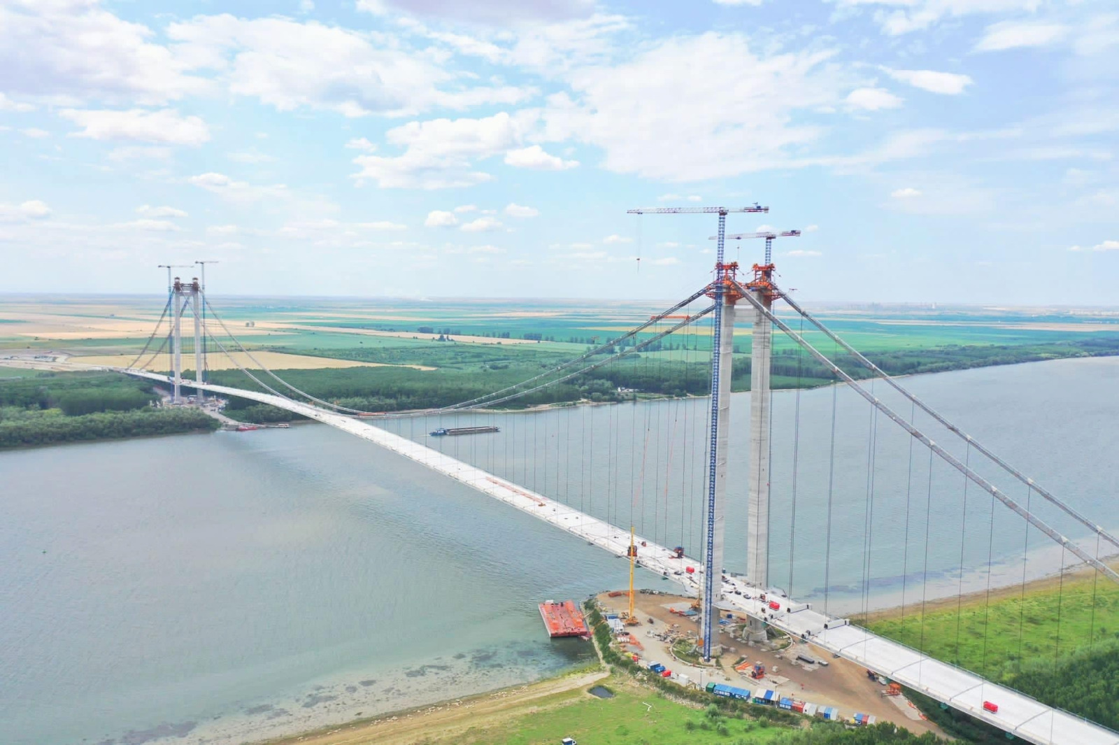 Inaugurarea Podului de la Brăila, amânată cu șase luni. CNAIR plătește despăgubiri de 29 milioane lei
